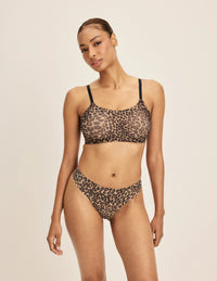 Ashley is a 32DD and wearing KNIX S+ | Cheetah Print