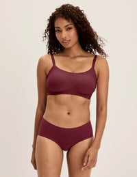 Ashley is a 34DD and wearing KNIX M+ | Dark Cherry