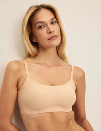 Isabelle is a 32C and wearing KNIX S | Warm Sand