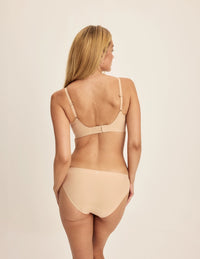 Isabelle is a 32C and wearing KNIX S | Warm Sand