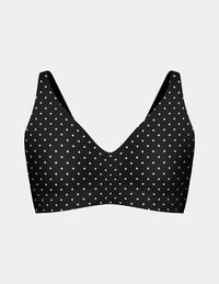 Wireless bra with a V-neckline, adjustable straps, and smooth molded cups, shown front-facing against a light gray background