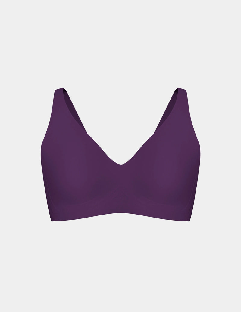 Wireless bra with a V-neckline, adjustable straps, and smooth molded cups, shown front-facing against a light gray background