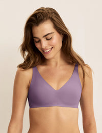 Ashley is a 34C and wearing KNIX S | Cosmic