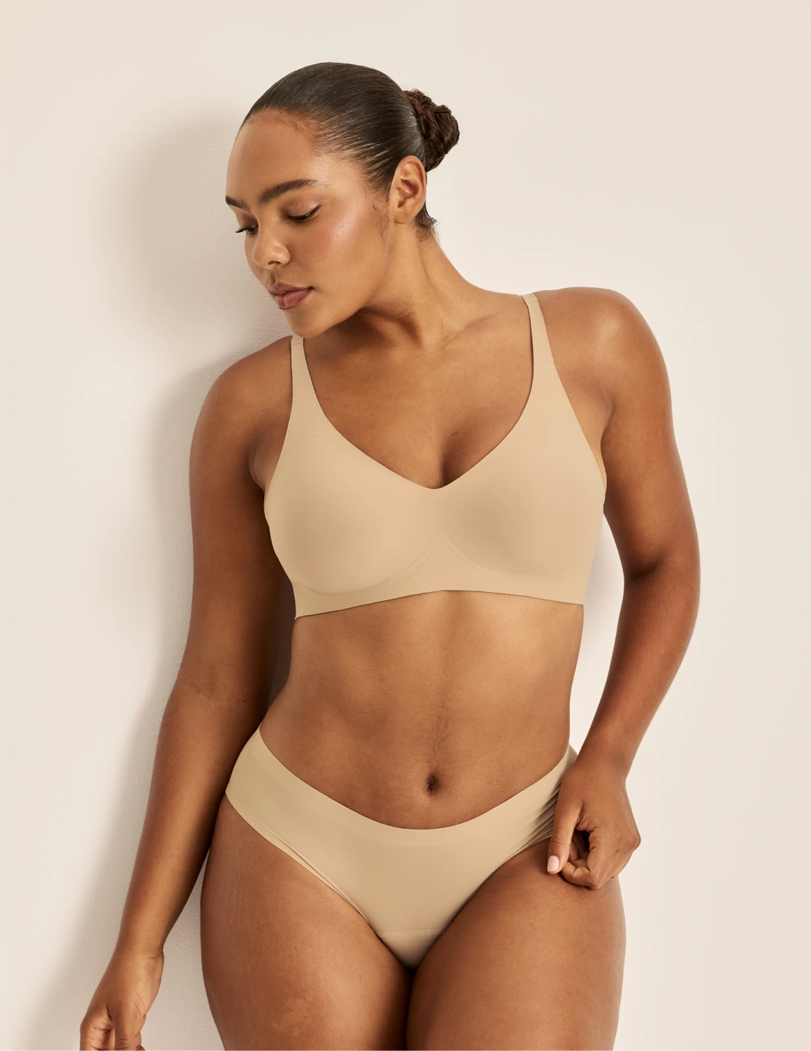 Amber is a 36C and wearing KNIX L  | Warm Sand