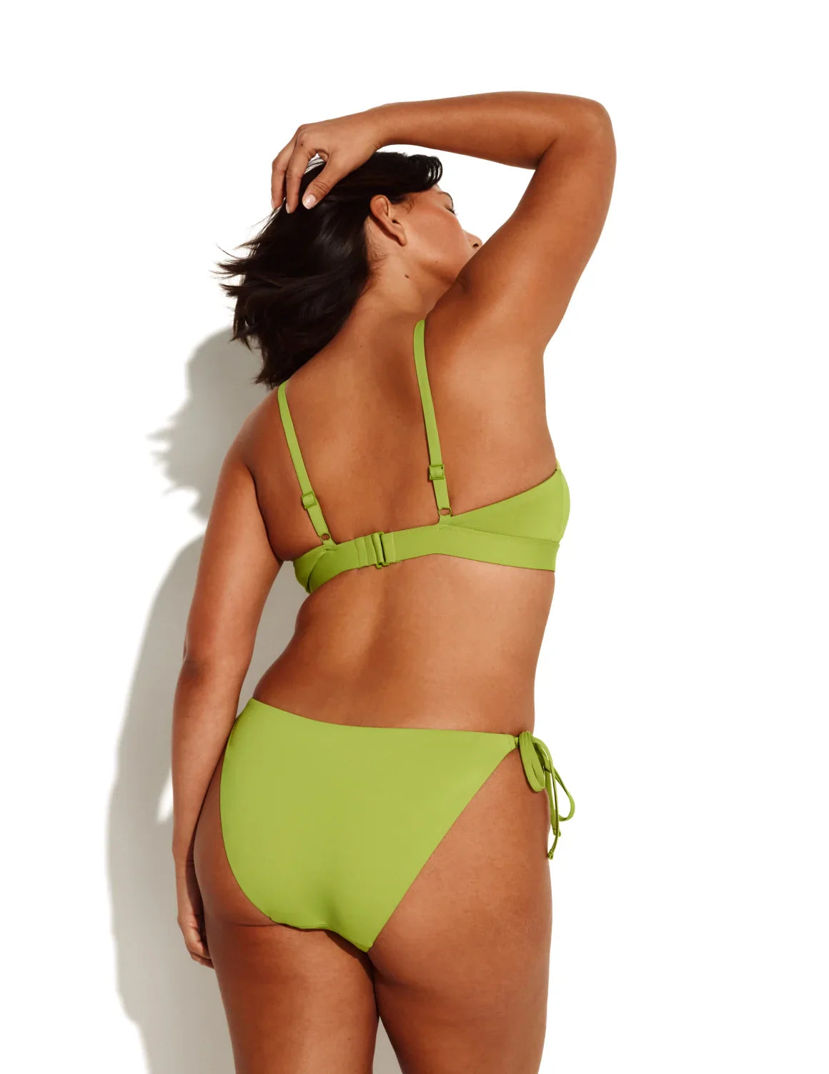 Maya is a 34DDD and wears a Knix size M+ | Chartreuse