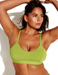 Maya is a 34DDD and wears a Knix size M+ | Chartreuse