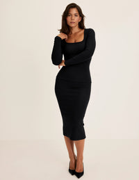 Maya is a 34DDD wearing KNIX M | Black