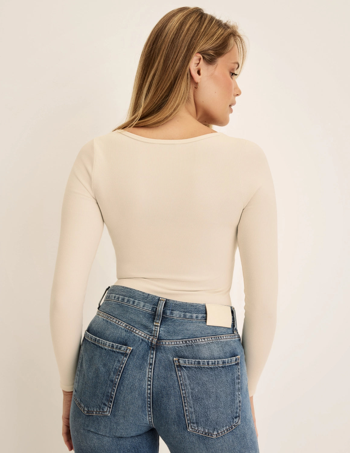 Sarah is a 34DD wearing KNIX M | Ivory