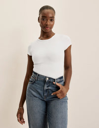 Orlane is a 32DD wearing KNIX S | White