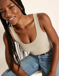 Gin is a 34DD wears a size M   | Fawn