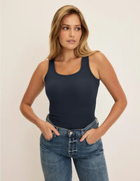 Front view of model wearing the SculptRib™ Cotton Tank highlighting the neckline, fabric and hugging fit