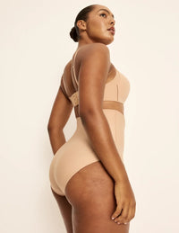 Amber has 46” hips, is 5’10.5” tall and wears a size L  | Warm Sand
