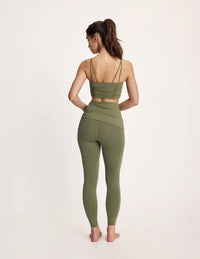 Maya is 5’10”, and wearing KNIX S | Olive