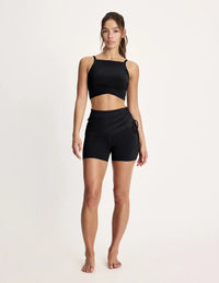 Maya is 5’10”, and wearing KNIX S | Black