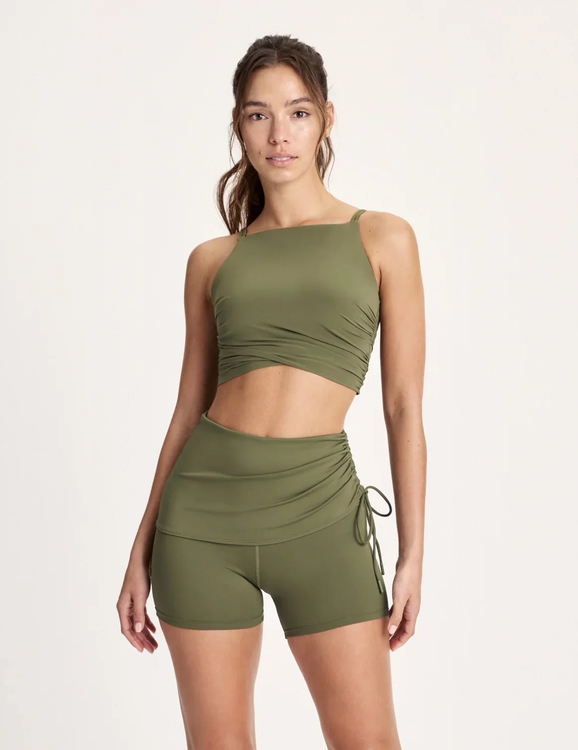 Maya is 5’10”, and wearing KNIX S | Olive