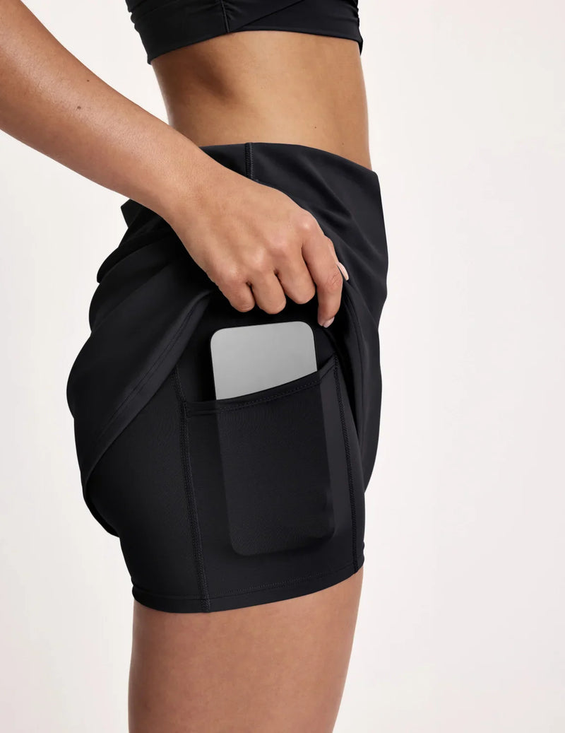 Maya is 5’10”, and wearing KNIX S  | Black