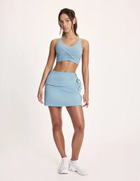 Maya is 5’10”, and wearing KNIX S | Blue Mist