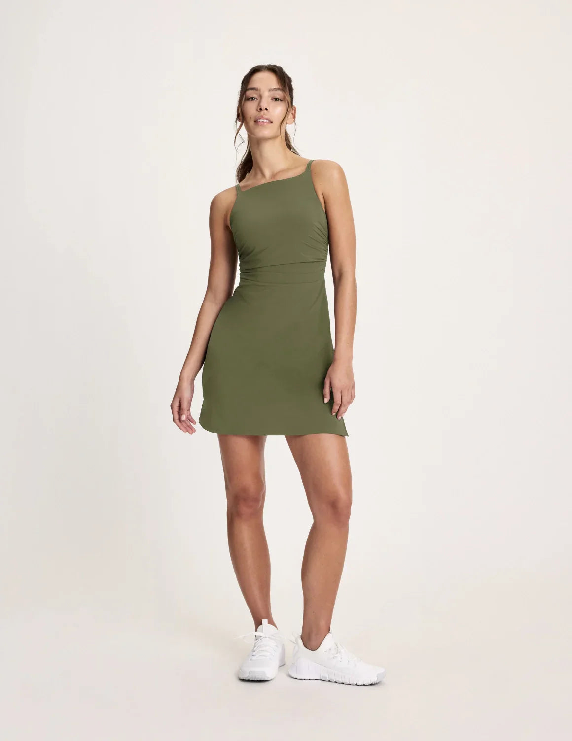 Maya is a 32A, 5’10”, and wearing KNIX XS | Olive