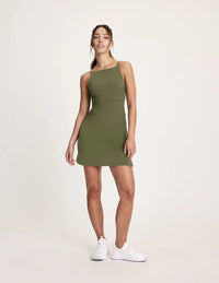 Maya is a 32A, 5’10”, and wearing KNIX XS | Olive