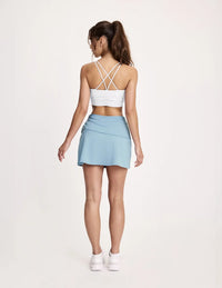 Maya is a 32A and wearing KNIX S | White