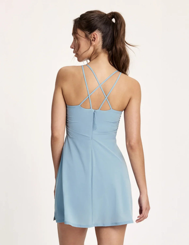 Maya is a 32A, 5’10”, and wearing KNIX XS | Blue Mist