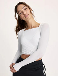 Maya is a 32A and wearing KNIX S | White