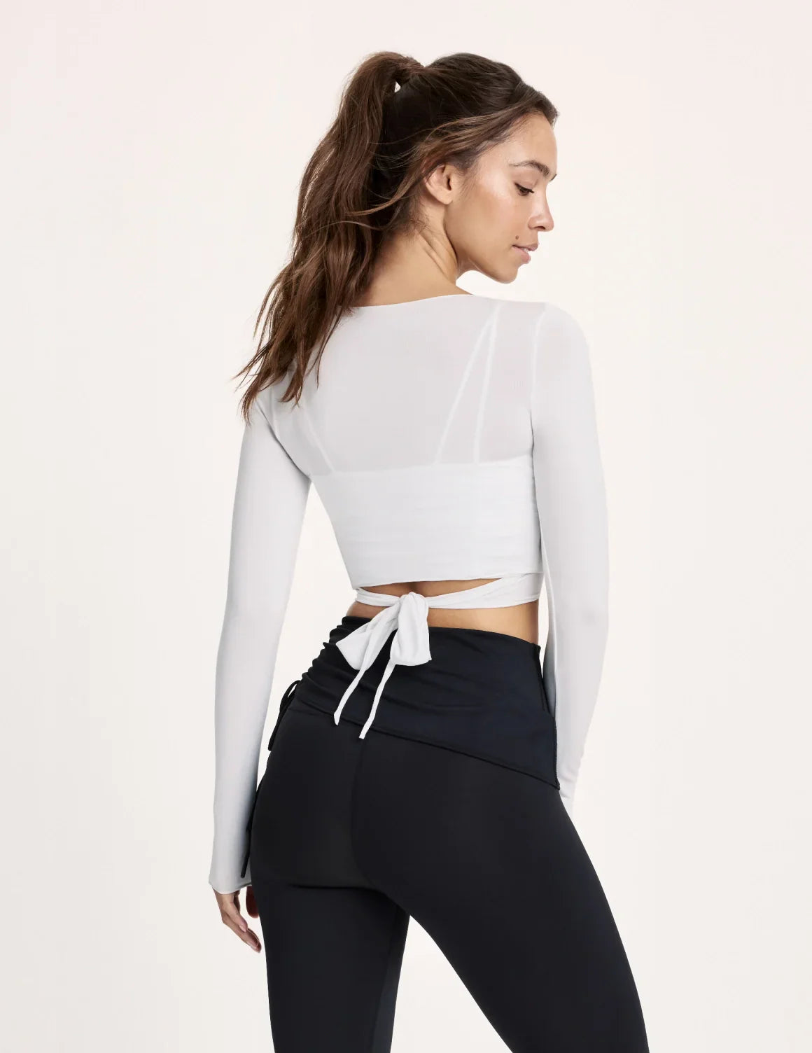 Maya is a 32A and wearing KNIX S | White