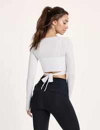 Maya is a 32A and wearing KNIX S | White