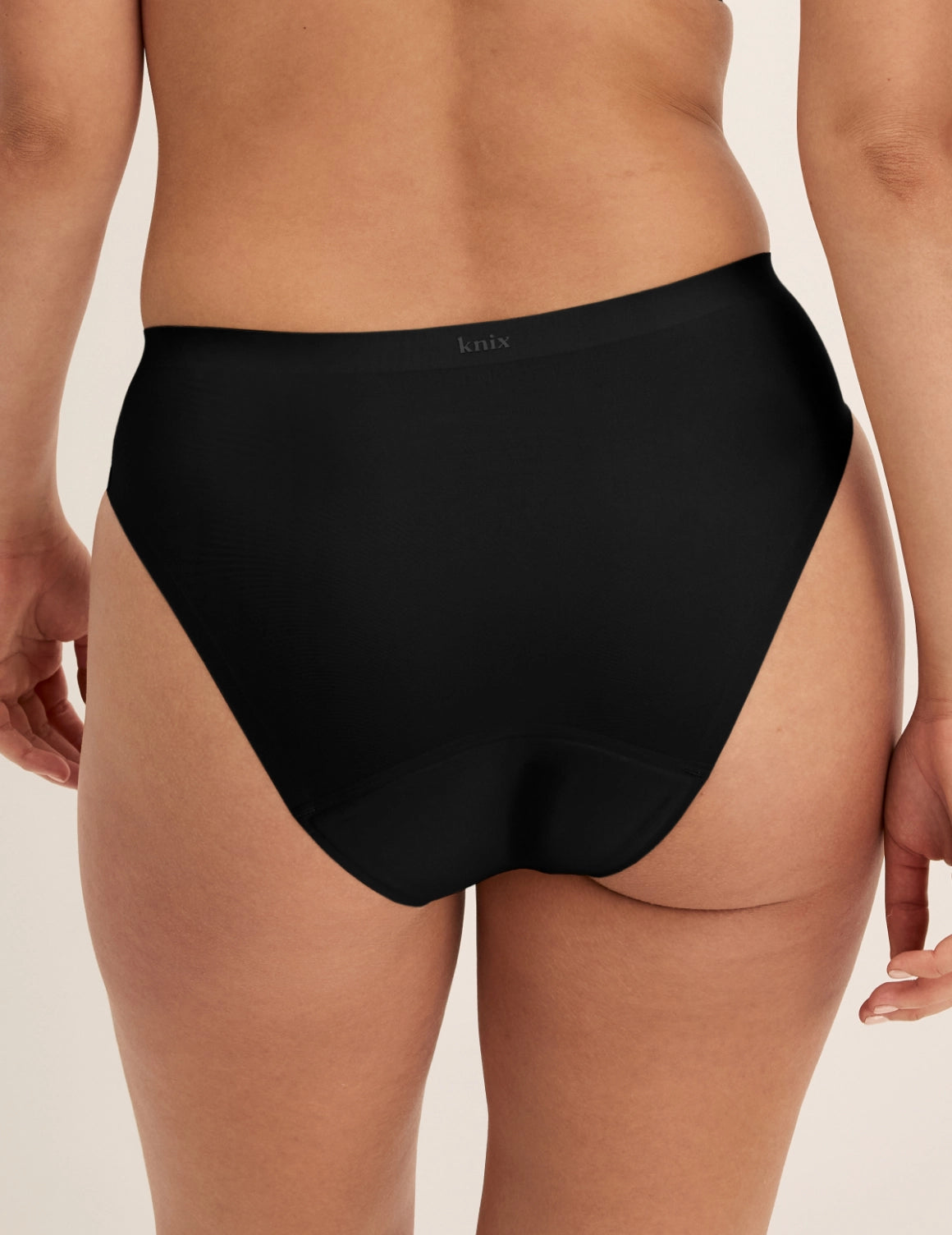 Megan has 36.5” hips and wears KNIX S | Black