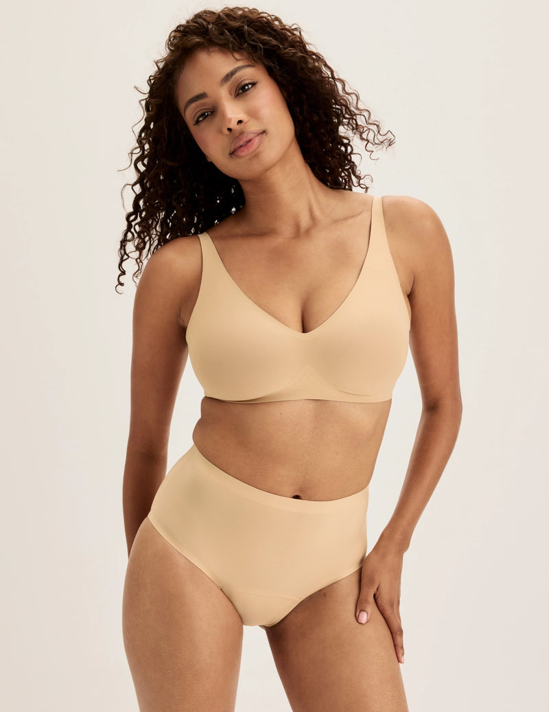 Full-body view of model wearing the Super Leakproof® No-Show High Rise highlighting the coverage and smooth fit