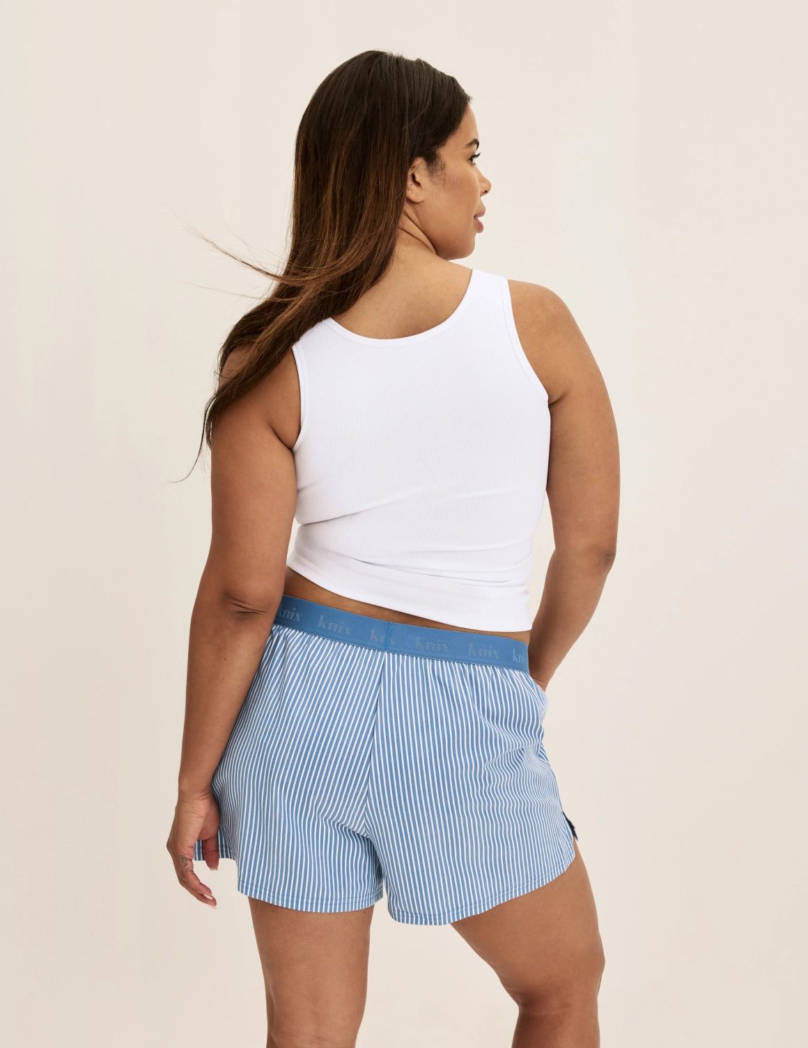 Binta wears KNIX L | Blue Stripe