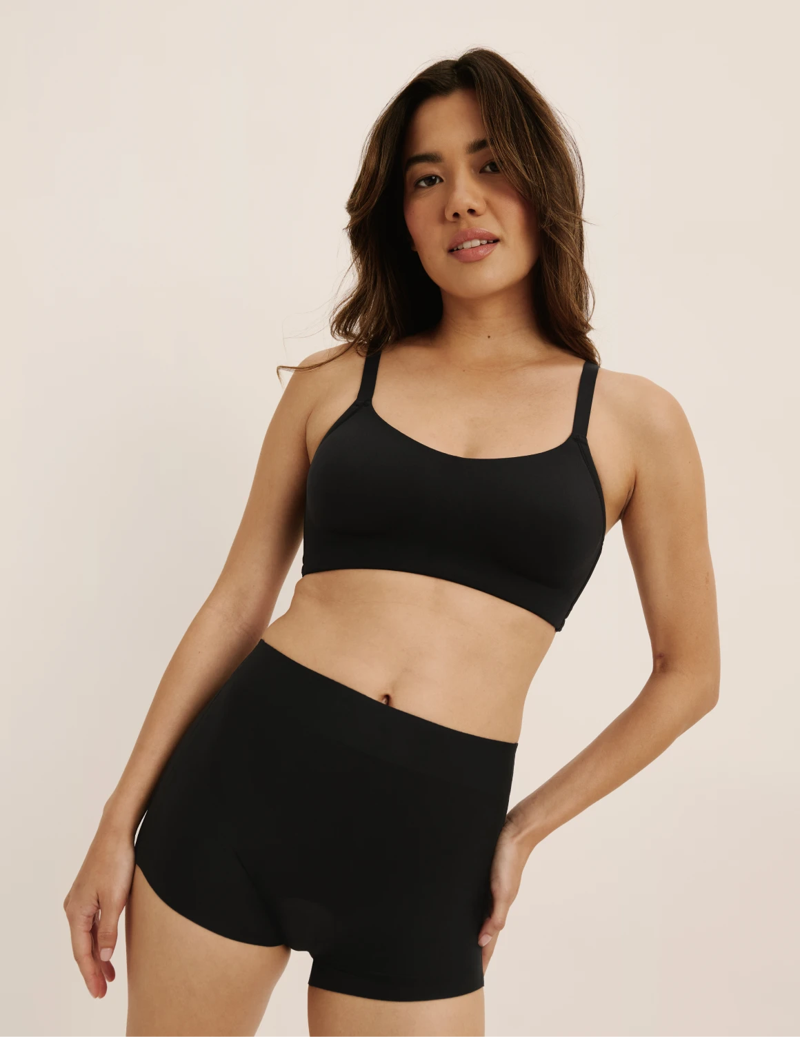 Julie is a 30C and wearing KNIX XS  | Black