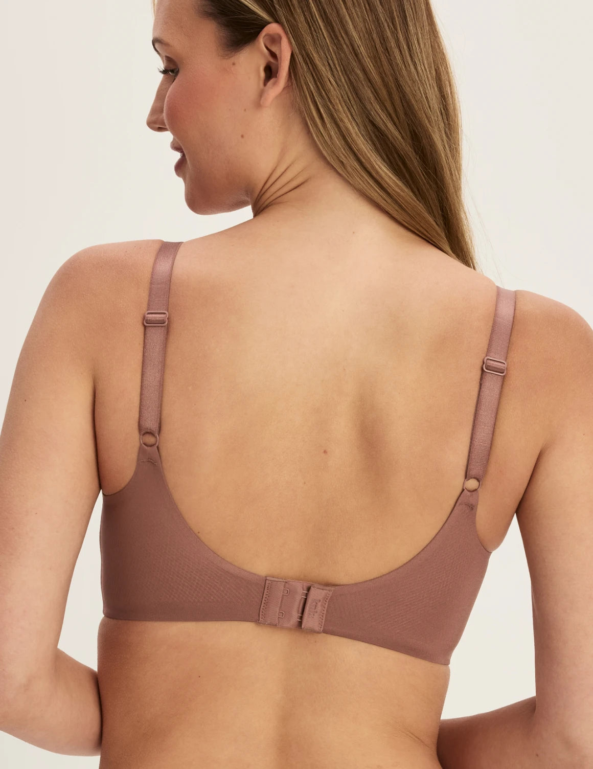 Megan is wearing a 32E | Sola