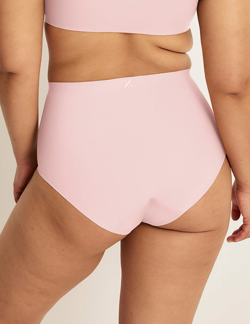 Back view of model wearing the Leakproof UltraThin No-Show High Rise highlighting the coverage and smooth fit