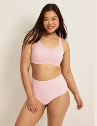 Front view of model wearing the Leakproof UltraThin No-Show High Rise highlighting the coverage and smooth fit